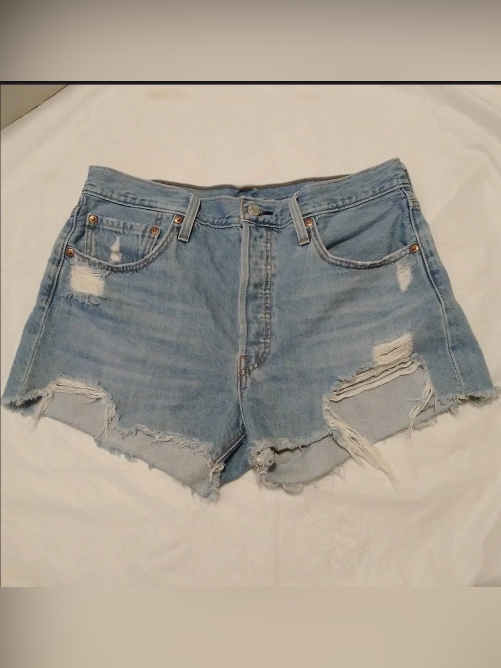 Levi’s 501 size 31 button fly distressed shorts